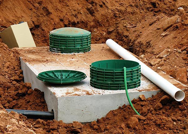 Hudson Septic Tank Cleaning | Rock Hill, York County, Chester County, Lancaster County | septic risers being placed in ground