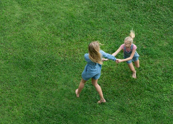 Hudson Septic Tank Cleaning | Rock Hill, York County, Chester County, Lancaster County | two young girls playing on green grass